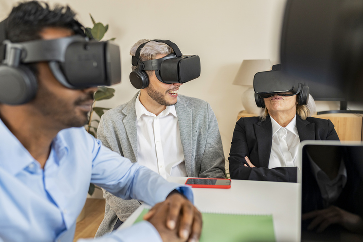 illustrate the future of employment three people in VR headsets to illustrate the future of employment